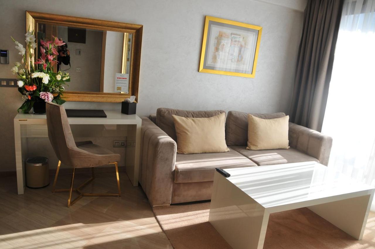 Suite Hotel Casa Diamond 카사블랑카 외부 사진 A living room in a hotel